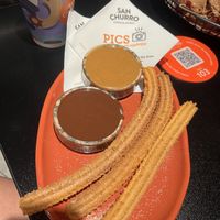 Amazing soy chai latter and churros with biscoff sauce and dark chocolate sauce !  at San Churro in Miranda
