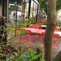 Outdoor seating. The also have a covered terrace. at Mam'Ayoka Pajol in Paris