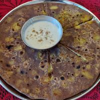 Aloo Paratha (100 INR) at Govinda's Yogi Cafe in Mysore