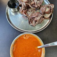 Ragi Momos and Tomato Soup at Govinda's Yogi Cafe in Mysore