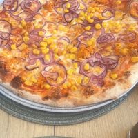 My partners - Chicken, sweetcorn and onion dairy pizza - options for everyone in your group  at Bella Pizzeria in Portimao