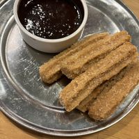 Churros con salsa de chocolate   at Verde Pistacho in Buenos Aires