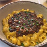 Mac and cheese with chili black beans .  at Nanita in Oaxaca