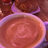 Oat milk latte and chocolate croissant   at Spicy Moon  - Bowery in New York City