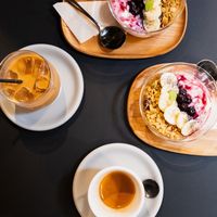 2 granola bowls, double espresso and iced oat latte  at Falo Coffee Brewers in Takayama