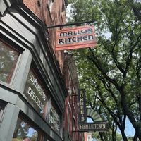 Sign out front  at Mallo's in Troy