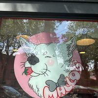 Sign out front  at Mallo's in Troy