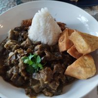 Cocked eggplants with rice and Fried tofu. 45k at Zaitun Restaurant Amed in Abang