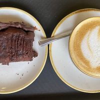 Chocolate and banana cake (vg) and oat flat white   at Cafe 3 Sixty in Newton Abbot