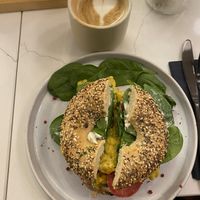 Vegan bagel with vegan cream cheese, tomato, spinach and vegan egg (7,50€) + small Cappuccino with soy milk (3,90€)  at OH Bagel in Muenster