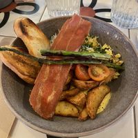 scrambled tofu with potatoes and vegan bacon  at Nihe in Tallinn