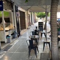 Front with outdoor seating at Early Bites in Athens