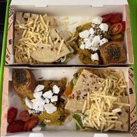 Omelette Greek style and club sandwich - They knew that we wanted to share both meals and served then like this to us which was really thoughtful!😄 at Early Bites in Athens