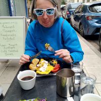 Thoroughly enjoying a nomelette! at Early Bites in Athens