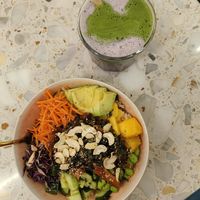 Lunch bowl with carrot lax and lavender matcha latte. at Superfood Deli 1010 in Vienna