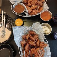 Two portions of chicken with sauces at Vampire's Chicken in Seoul