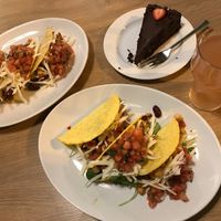 Lemonade, chocolate cake and tacos. 💚 (November 2019) also they offer taco Tuesdays, when you get one taco for 1 euro!!  at MiiT in Riga