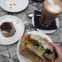 Vegan sandwhich, stracciatella cake, hot chocolate with oat milk at MiiT in Riga