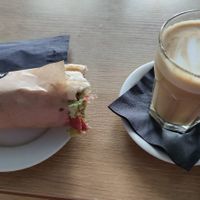 Baguette with vegan "meat" and a large latte. at MiiT in Riga