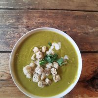 Cream of pea soup with croutons at MiiT in Riga