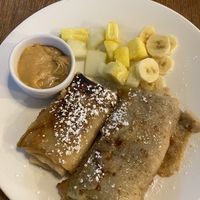apple filled pancakes/crepes with caramel sauce and fresh fruit  at MiiT in Riga