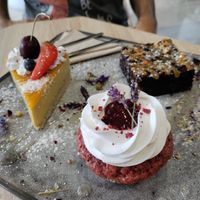 Mango cake, amazing berry cupcake with hidden cream inside, and choc hazelnut brownie for breakfast! at VíK - Vegan Venue in Bratislava