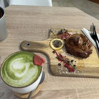 Soy matcha latte & almond pastry  at VíK - Vegan Venue in Bratislava