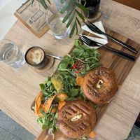 Bagels with “egg” spread and seitan, coffe w soya milk  at VíK - Vegan Venue in Bratislava