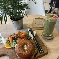Salami bagel and iced matcha latte  at VíK - Vegan Venue in Bratislava