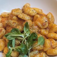 Gnocchi with coconut and tomato sauce at Kefyro ūsai in Palanga
