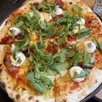 Great Vegan cheese on pizza 🤌🏻  at Innocent Cafe in Riga