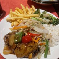 Vegan duck is soya sauce, chips, chop suey, broccoli, rice, also had vegan chicken in curry saucee  at Great Asia in Lanzarote