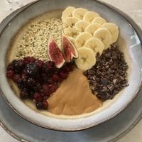 Porridge. So good!! at Simply Raw Bakery and Bistro in Vienna
