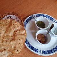 Tandoor roti with sauces (note, white sauce is yoghurt, not vegan) at Indian Tandoori in Bruges