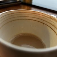 Almost finished but really nicely foamed oat capocino  at BUD - Flocafe in Budapest