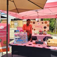 Booth at West Oakland Farmer's Market at Juicy Cookie Company in Oakland