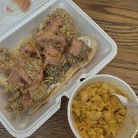 Fried oyster mushroom hoagie and a side of mac n cheese already half gone because I inhaled it after the first bite   at All That To Go in Cumberland