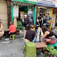 As you can see, the owner has a stack of seats now. at Bánh Mì chay Vegan in Hanoi