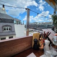 Seats outdoors on the roof at Basta in Stockholm