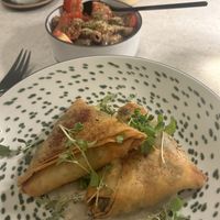 Samosas w/ side dish tomato salad  at One80  in Valletta