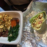 Breakfast bowl and tofu breakfast sandwich on a spinach wrap (both are half gone!) at Blossom Du Jour - Midtown in New York City