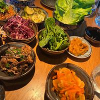 Vegan, sharing, platter, kimchi, lettuce to wrap, mushrooms, cucumber, salad, Red cabbage, beansprouts, spinach, Tofu, jackfruit and Eda, Mami, frittatas. Plus different sauces at Arc in Stockholm