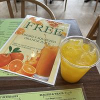 Super generous free fresh squeezed OJ with every £10 purchase  at Garden of Eden in Windsor
