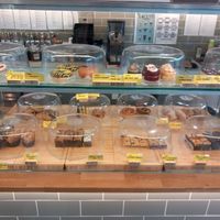 All behind and under glass for hygiene, clearly labelled and such vast choice! at Garden of Eden in Windsor