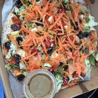 Salad Pizza (🤯) on a GF crust  at La Familia Katonah in Katonah
