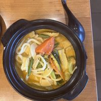 Roasted udon noodles with tofu on curry sauce  at Yobi Food in Pardubice