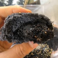 Heavenly, thick almond-buttery paste with pieces of almond and sesame, within fluffy and light, steaming hot bread at Pun-Pao Steamed Buns in Chiang Mai