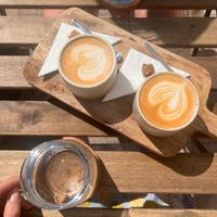 oat cappuccinos with a piece of vegan cookie at Loaf in Gzira