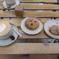 Latte with plant milk, vegan and gluten free cookies at Loaf in Gzira