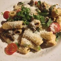 Rigatoni with pistachio pesto sauce - it's listed as vegan on the menu and, even though the waiter confirmed the dish would be served with a vegan Parmesan, it came with real Parme at PSI in Lisbon